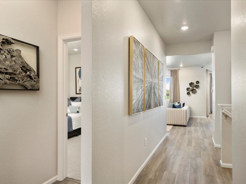 Furnished interior in a model home at Poudre Heights: The Alpine Collection in Windsor (Image 17).