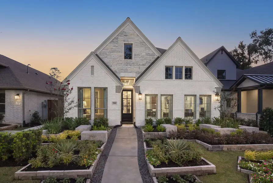 Front exterior of a home in the The Highlands 45' community, located in Porter, TX (Image 2).