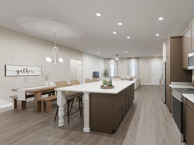 Your new kitchen is designed with a large island, quartz counters, and a walk-in pantry. (Artist`s rendering)