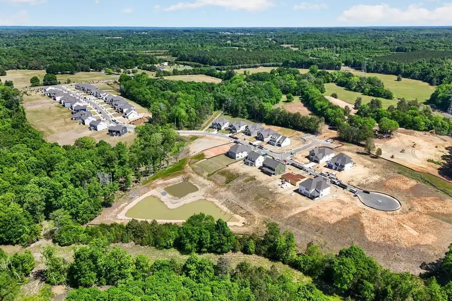 Aerial view of the Tramore community in Harrisburg, NC, showing layout and nearby surroundings (Image 9). Aerial view of the Tramore community in Harrisburg, NC, showing layout and nearby surroundings (Image 9).