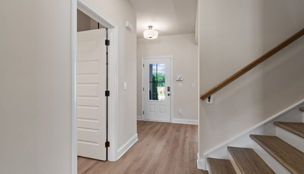 Furnished interior in a model home at Kentmere in Auburn (Image 7).