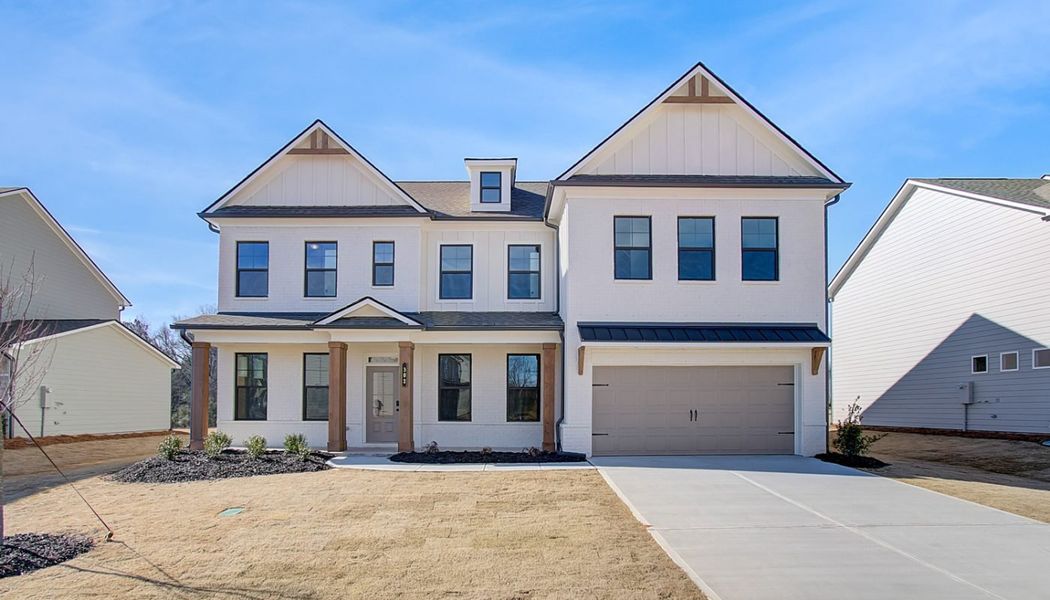 Front exterior of a home in the Ponderosa Farms Reserve community, located in Gainesville, GA (Image 17).