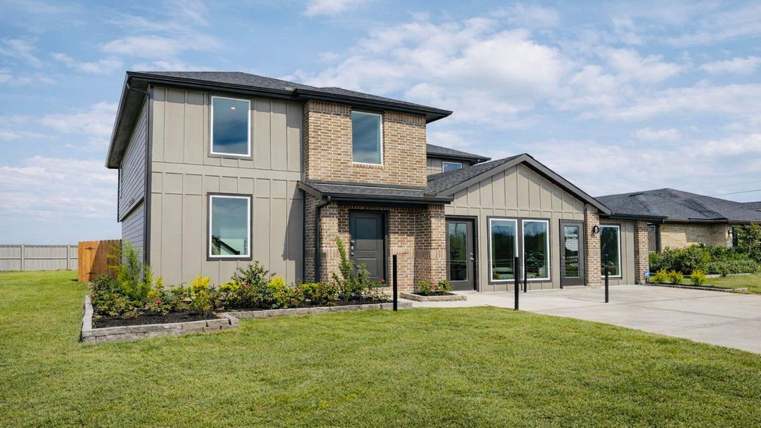 Front exterior of a home in the Westward Pointe community, located in Sealy, TX (Image 4).