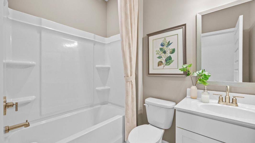 Furnished interior in a model home at Westland in Bogart (Image 17).