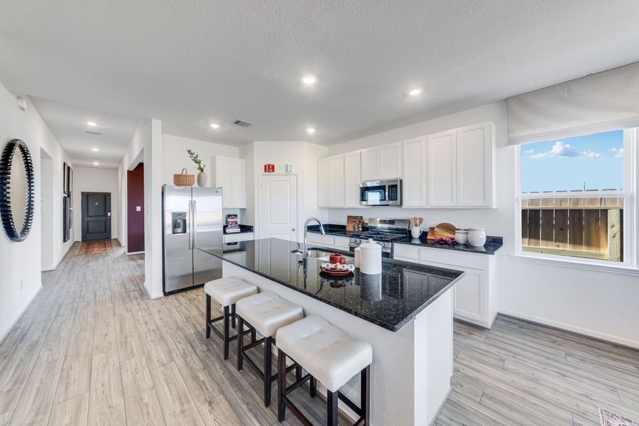 Furnished interior in a model home at Raburn Reserve 50s in Tomball (Image 48).