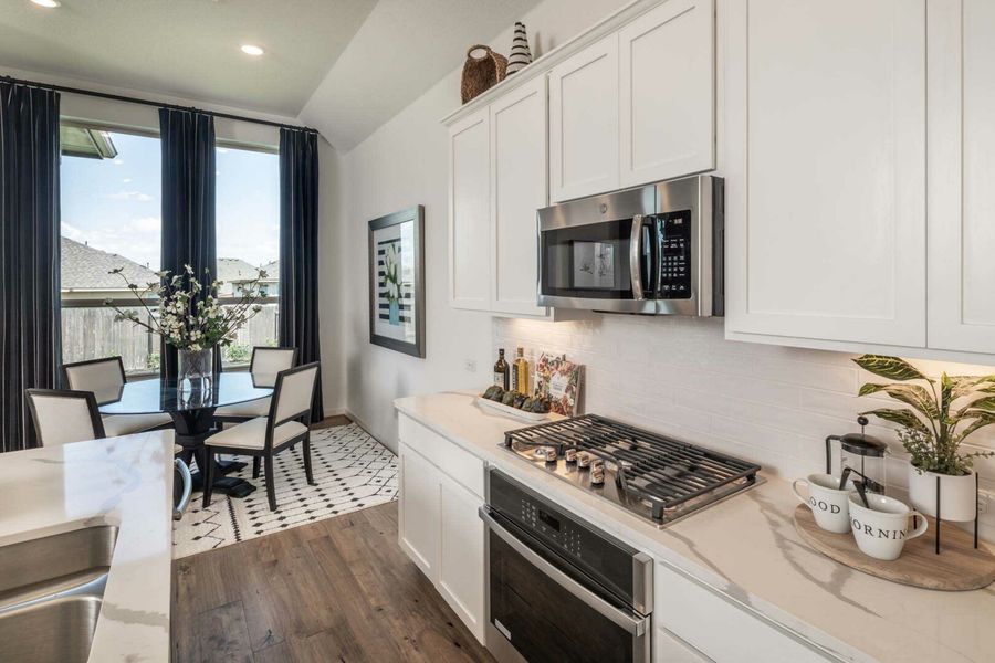 Furnished interior in a model home at Crosswinds: 60ft. lots in Kyle (Image 18).