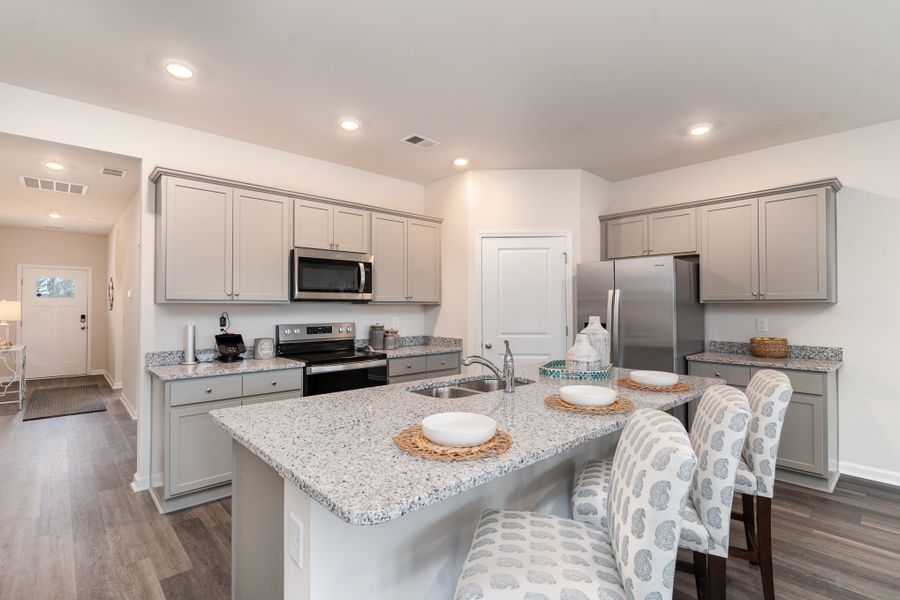 Furnished interior in a model home at Kingston Bay in Conway (Image 3).