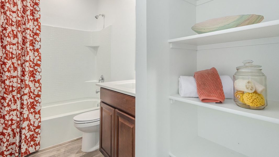 Furnished interior in a model home at Roadrunner Estates in Tucson (Image 33).