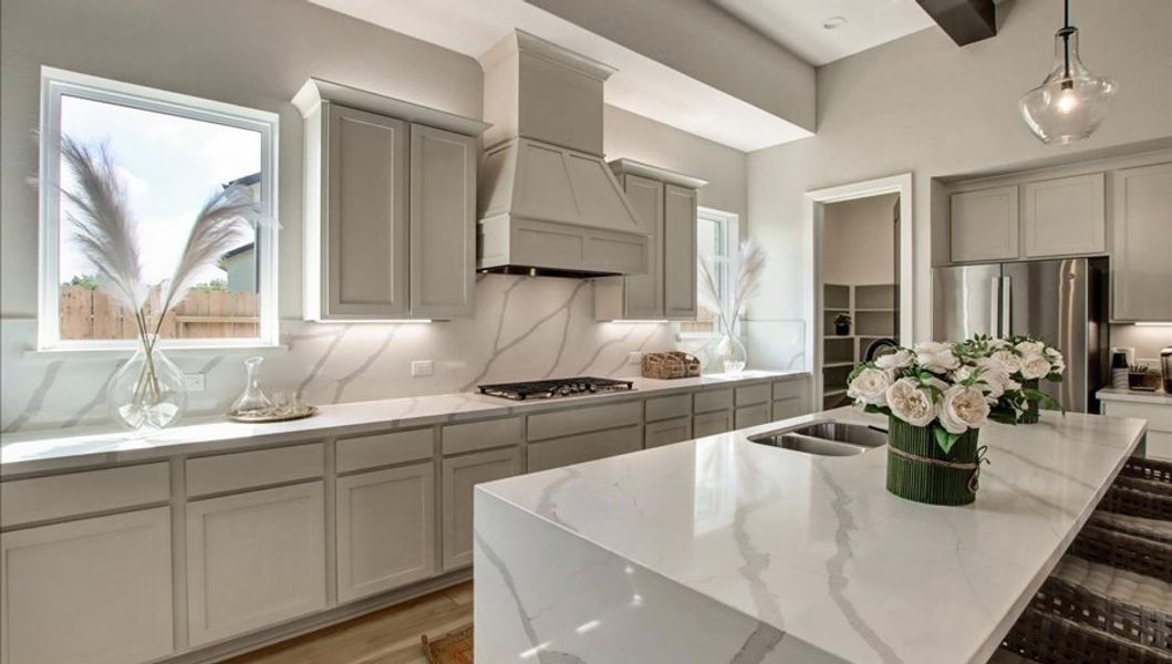 Furnished interior in a model home at Sunterra 40 in Katy (Image 26).