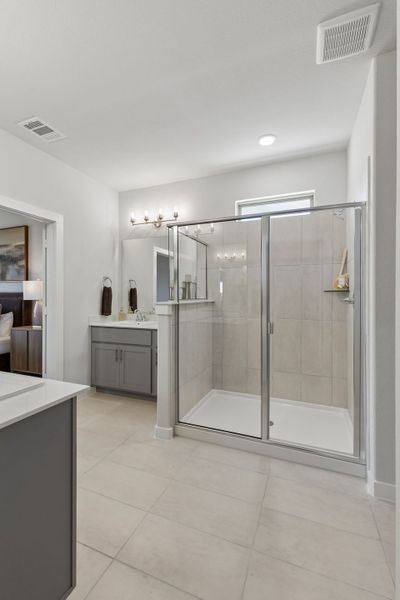 Primary Bathroom in the Winters model home in Gunter TX by Trophy Signature Homes