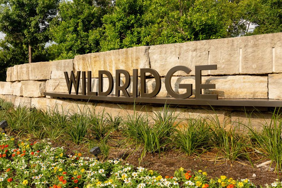Entrance to the Wildridge community in Oak Point, TX, featuring signage and landscaping (Image 1). Entrance to the Wildridge community in Oak Point, TX, featuring signage and landscaping (Image 1).