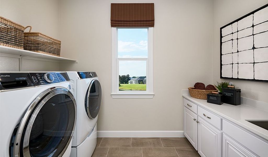 Furnished interior in a model home at Bongard Estates in Clermont (Image 16).