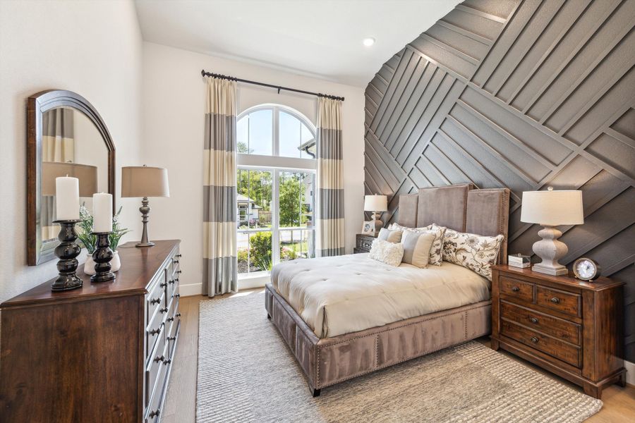 Furnished interior in a model home at The Woodlands Hills – 65' in Willis (Image 20).