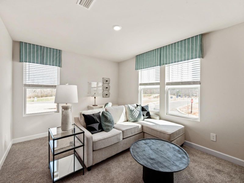 Furnished interior in a model home at Russell Grove - Rolling Hills Series in Charlotte (Image 8).