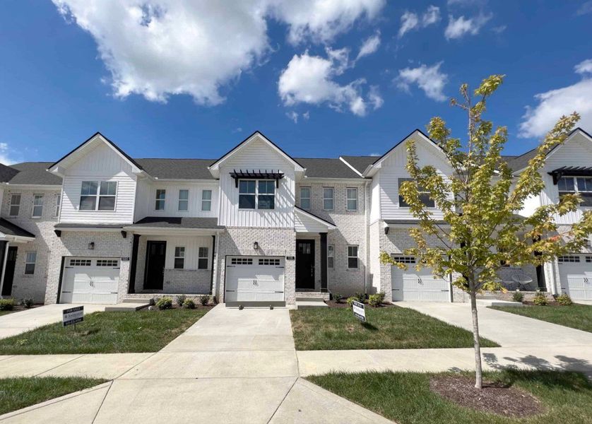 Front exterior of a home in the The Grove at Kennesaw Farms community, located in Gallatin, TN (Image 5).