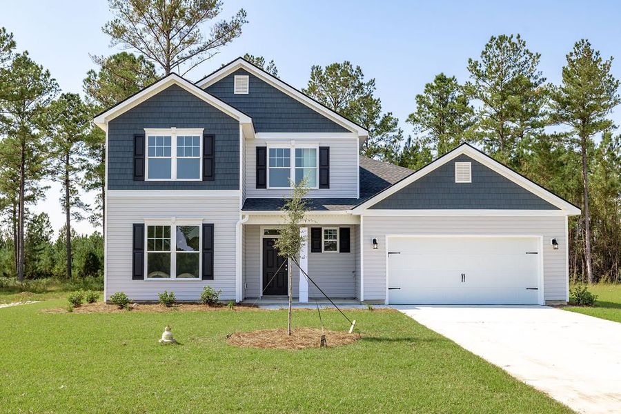 Front exterior of a home in the Camden Crossing community, located in Savannah, GA (Image 10). Front exterior of a home in the Camden Crossing community, located in Savannah, GA (Image 10).