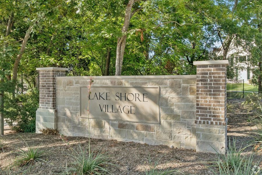 Entrance to the Lake Shore Village community in Rowlett, TX, featuring signage and landscaping (Image 2).