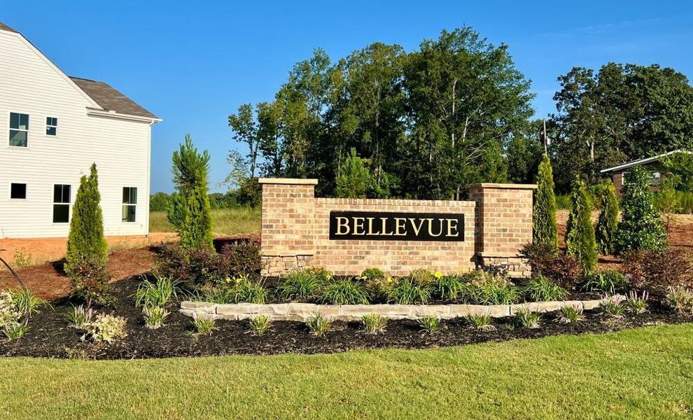 Entrance to the Bellevue Townhomes community in Greenville, SC, featuring signage and landscaping (Image 1). Entrance to the Bellevue Townhomes community in Greenville, SC, featuring signage and landscaping (Image 1).