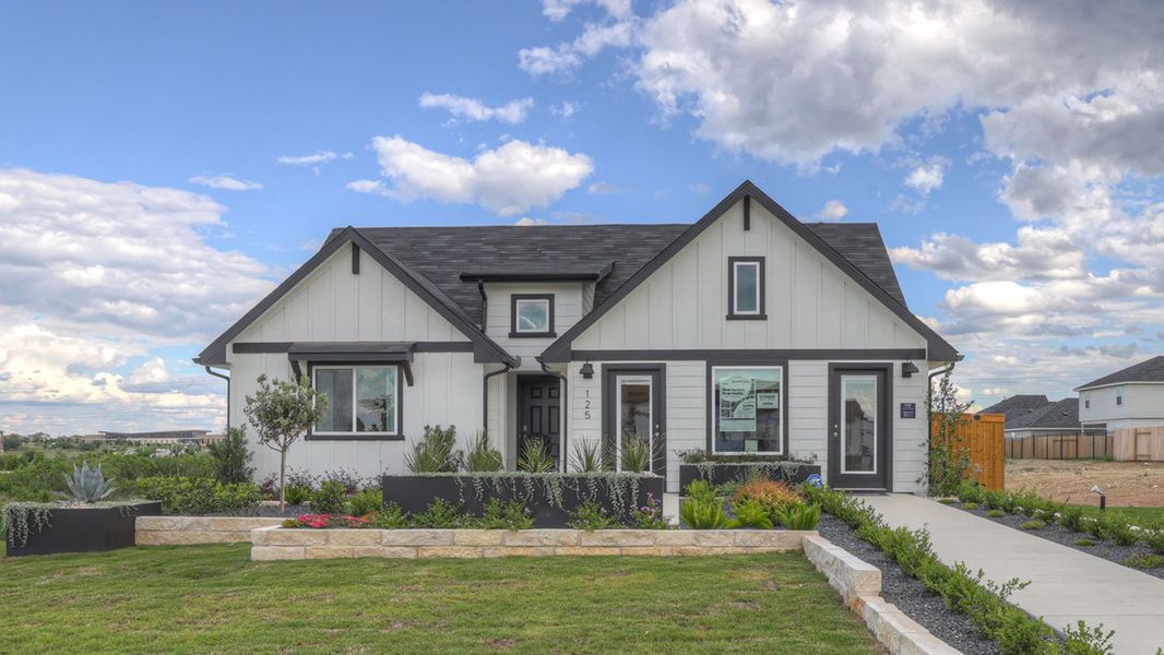 Front exterior of a home in the Trace community, located in San Marcos, TX (Image 5). Front exterior of a home in the Trace community, located in San Marcos, TX (Image 5).