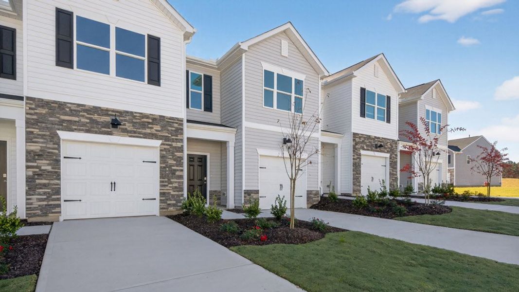Front exterior of a home in the The Townes at Galvins Ridge community, located in Sanford, NC (Image 10).