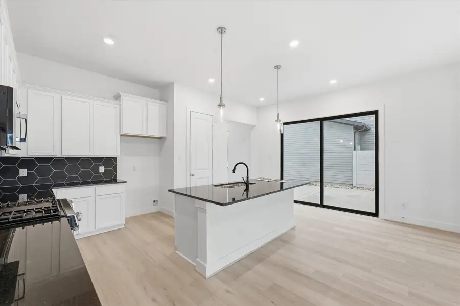 Furnished interior in a model home at Symphony in Montgomery (Image 32).