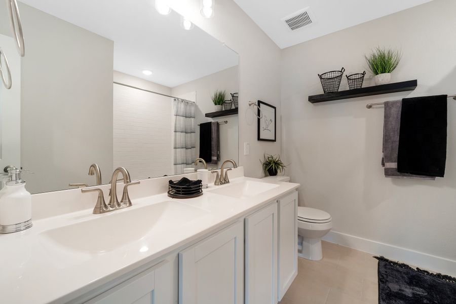 Furnished interior in a model home at Bluestem in Brookshire (Image 25). Furnished interior in a model home at Bluestem in Brookshire (Image 25).