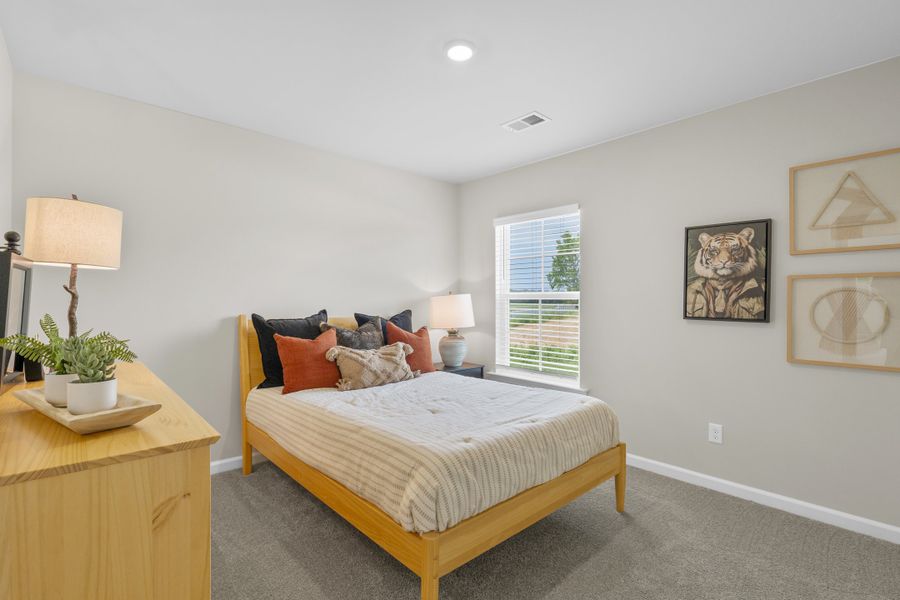 Furnished interior in a model home at Harmon Terrace in Hopkins (Image 25).