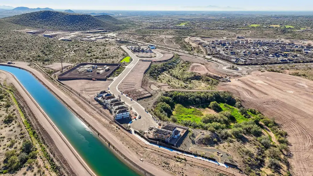 Aerial view of the The Buttes at Mystic community in Peoria, AZ, showing layout and nearby surroundings (Image 1). Aerial view of the The Buttes at Mystic community in Peoria, AZ, showing layout and nearby surroundings (Image 1).