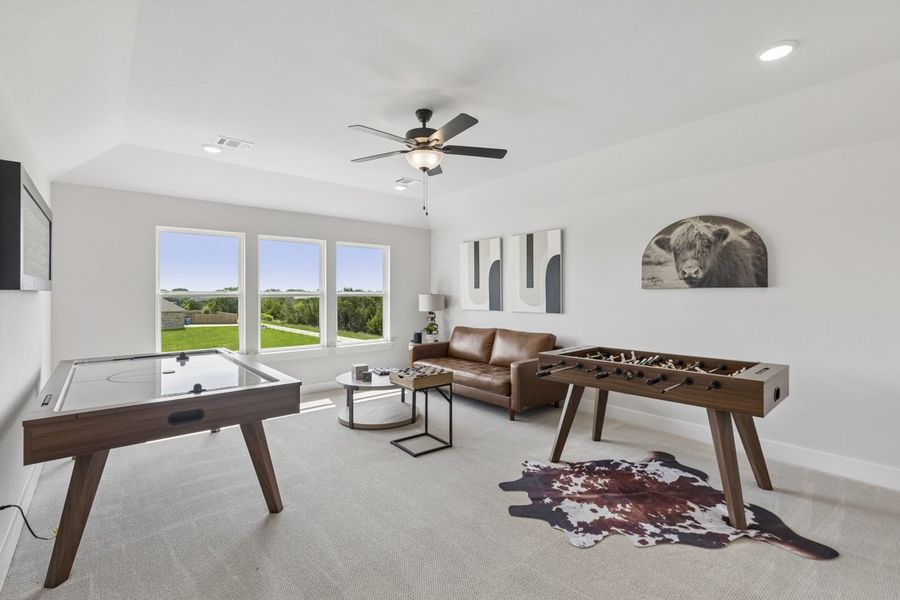 Furnished interior in a model home at Ten Mile Creek in DeSoto (Image 19).