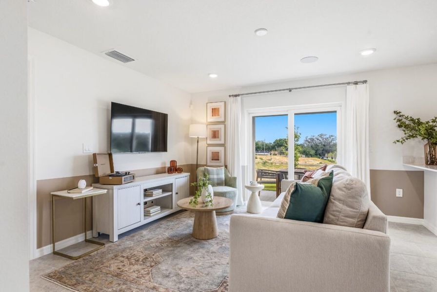 Furnished interior in a model home at Citrus Ridge in Lake Wales (Image 7).