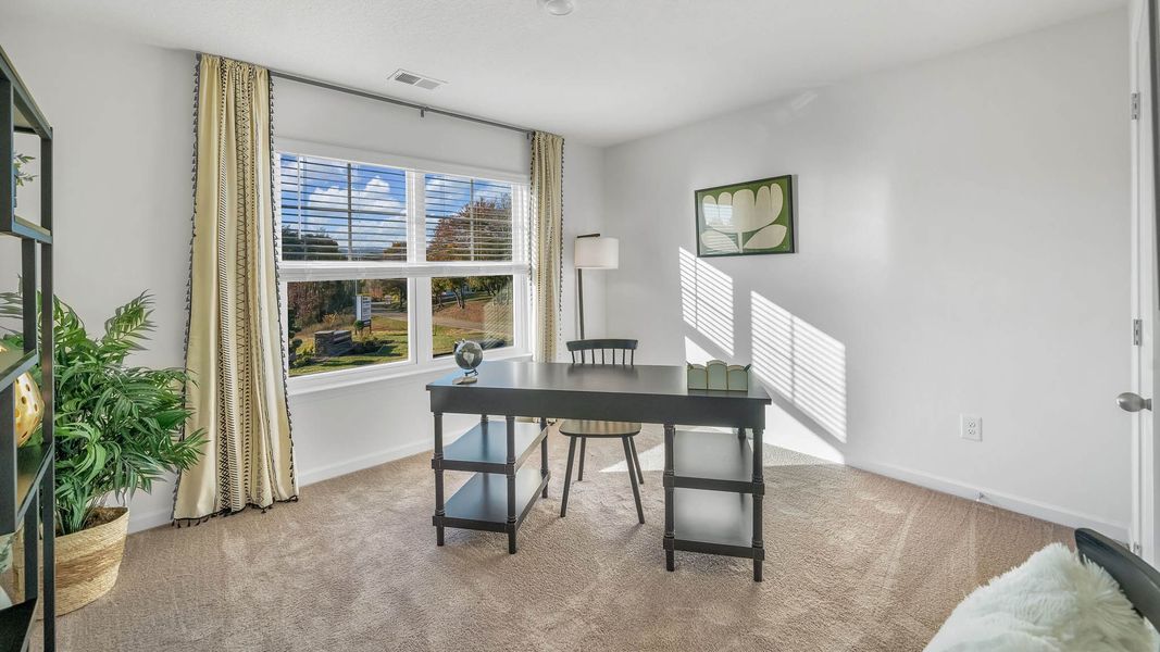 Furnished interior in a model home at Whispering Springs in Maryville (Image 29). Furnished interior in a model home at Whispering Springs in Maryville (Image 29).