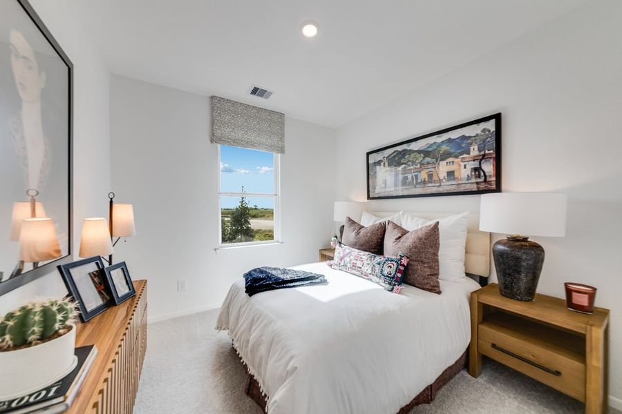 Furnished interior in a model home at Raburn Reserve 50s in Tomball (Image 56).