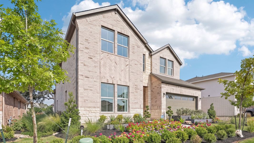Front exterior of a home in the The Enclave at Bar W Ranch community, located in Leander, TX (Image 16). Front exterior of a home in the The Enclave at Bar W Ranch community, located in Leander, TX (Image 16).
