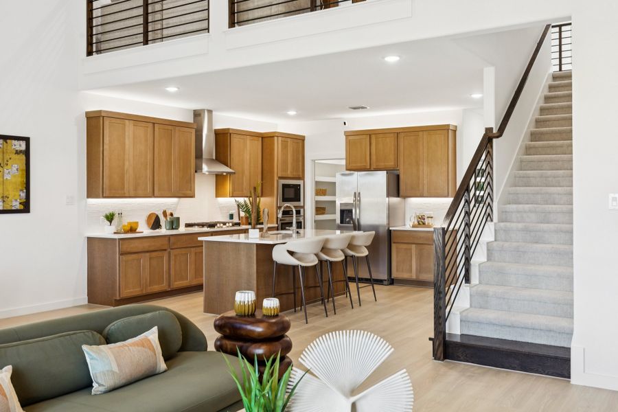REPRESENTATIVE PHOTO – Kitchen in the Winters model home in Aledo TX by Trophy Signature Homes