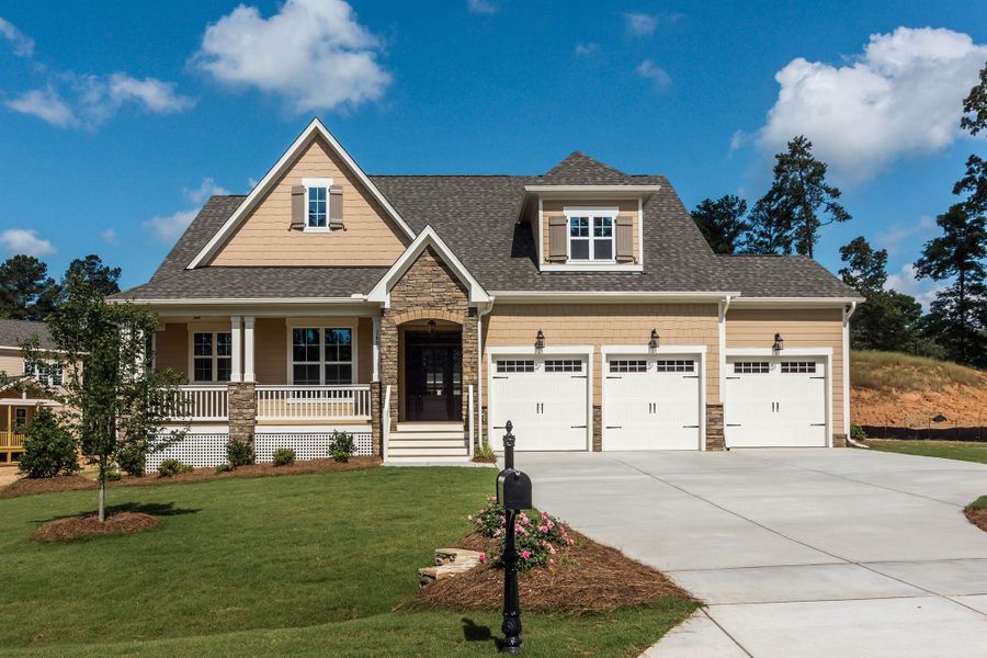 Front exterior of a home in the Brighton Forest - Apex - Robuck Homes community, located in Garner, NC (Image 13).