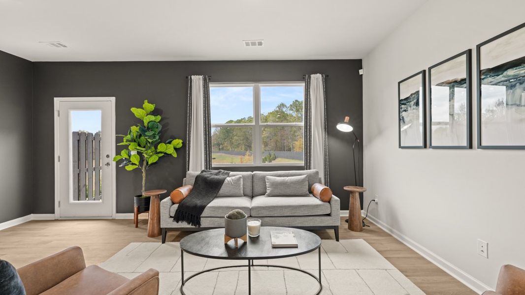 Furnished interior in a model home at Woodbury Park in Atlanta (Image 26).