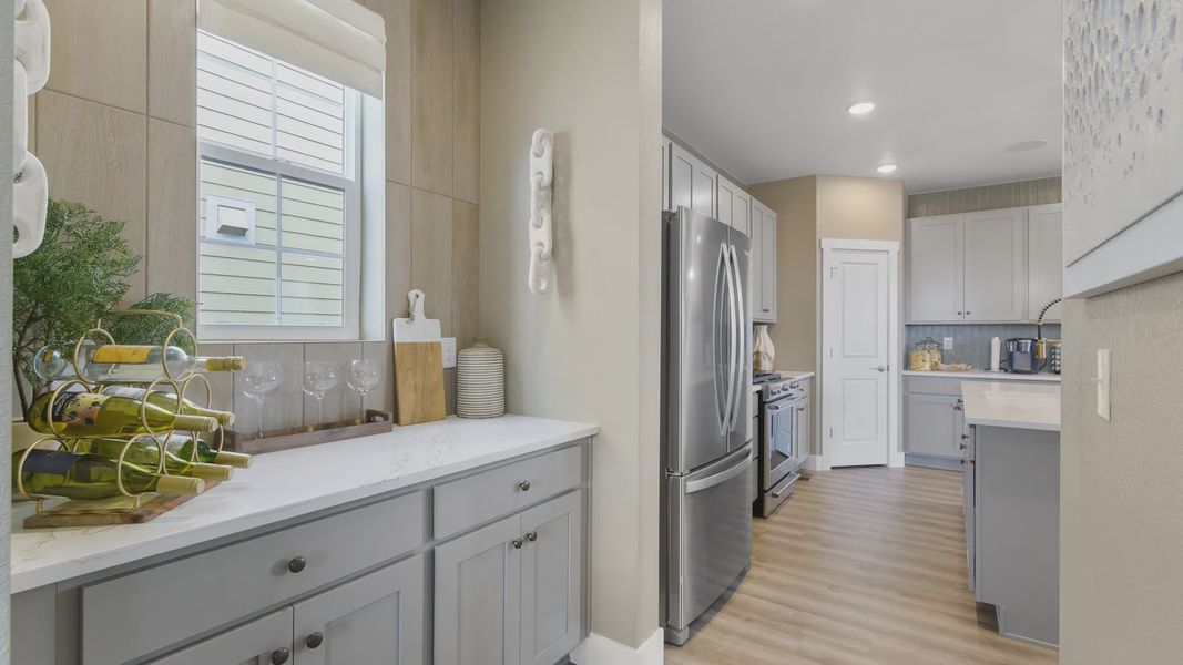 Furnished interior in a model home at Windler Single Family Homes in Aurora (Image 4).