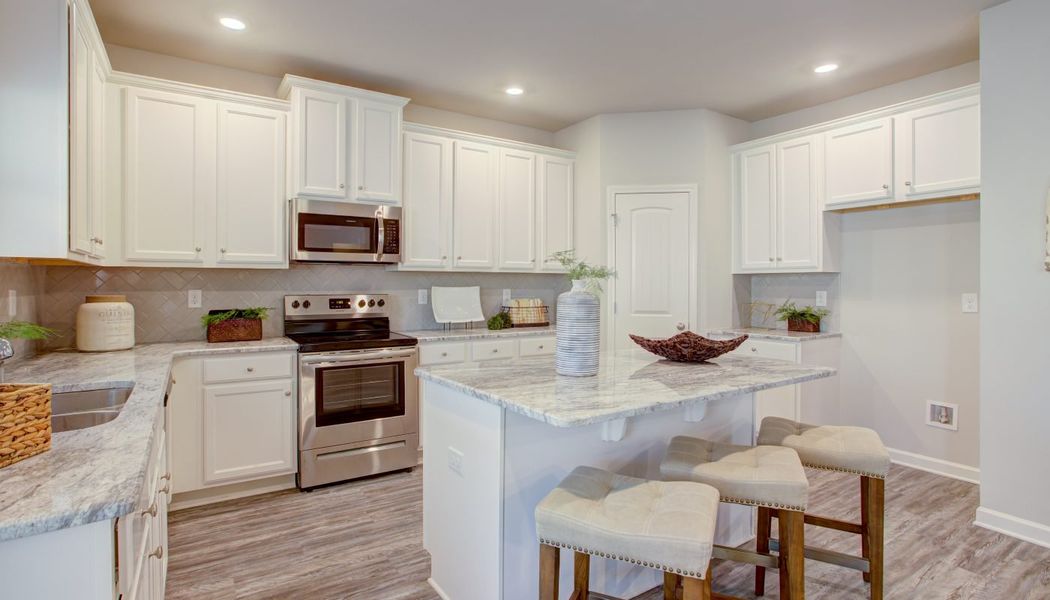 Furnished interior in a model home at Cove Lake Estates in Conley (Image 29).