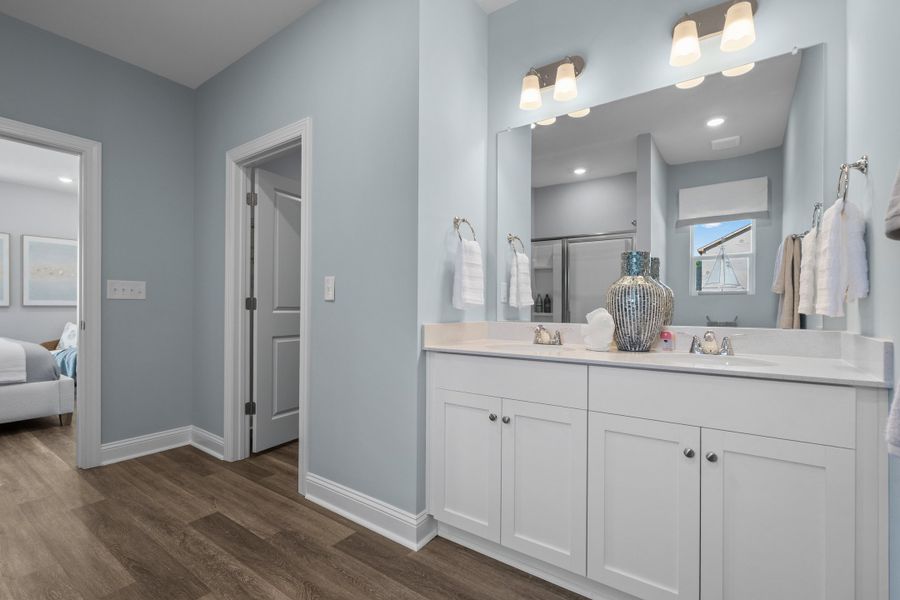 Furnished interior in a model home at Creekview Landing in Shallotte (Image 10).