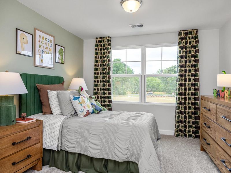 Furnished interior in a model home at Springvale in Willow Spring (Image 15).