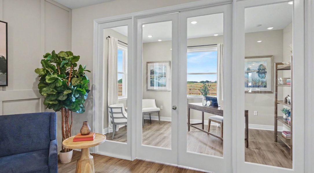 Furnished interior in a model home at Bella Estates in Plant City (Image 8).