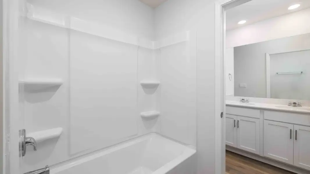 Furnished interior in a model home at Sweetwater Village in Rockwell (Image 23).