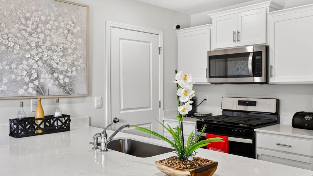 Furnished interior in a model home at Village 3 in Woodruff (Image 14). Furnished interior in a model home at Village 3 in Woodruff (Image 14).