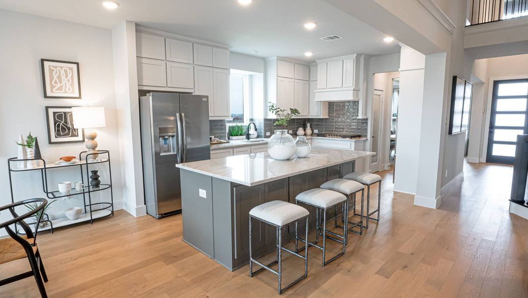 Furnished interior in a model home at The Villages of Hurricane Creek in Anna (Image 7).