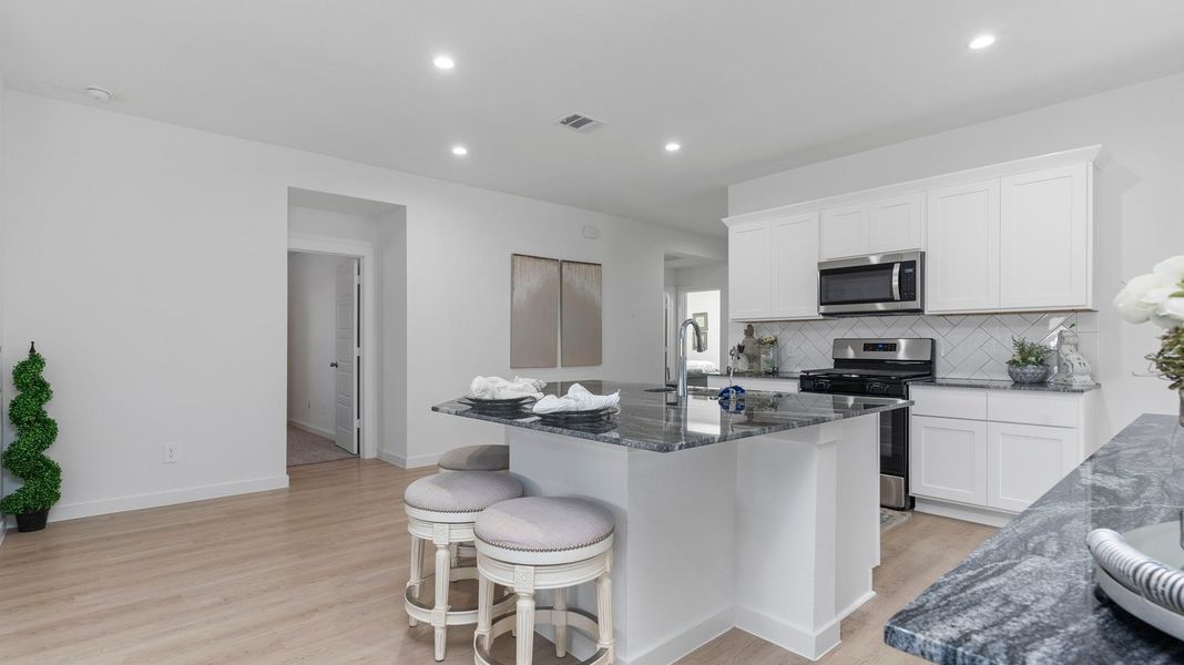 Furnished interior in a model home at Caldwell Crossing in Iowa Colony (Image 19). Furnished interior in a model home at Caldwell Crossing in Iowa Colony (Image 19).