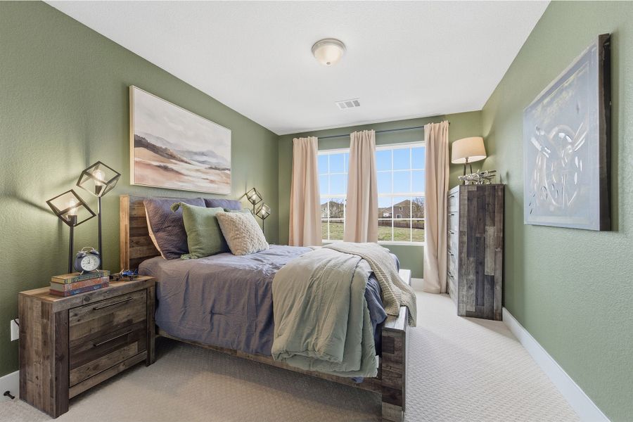 Furnished interior in a model home at Infinity Square in Kyle (Image 33).