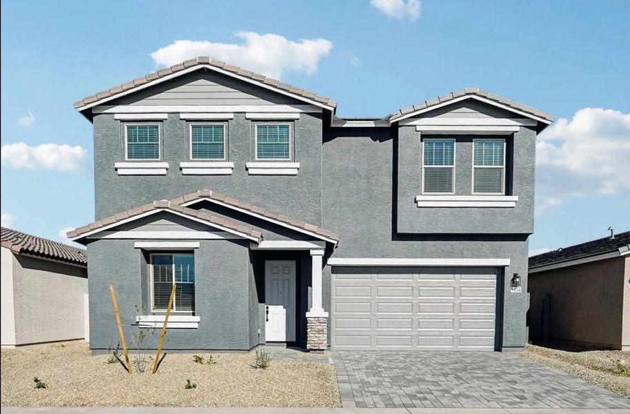 Front exterior of a home in the Amarillo Creek community, located in Maricopa, AZ (Image 12).