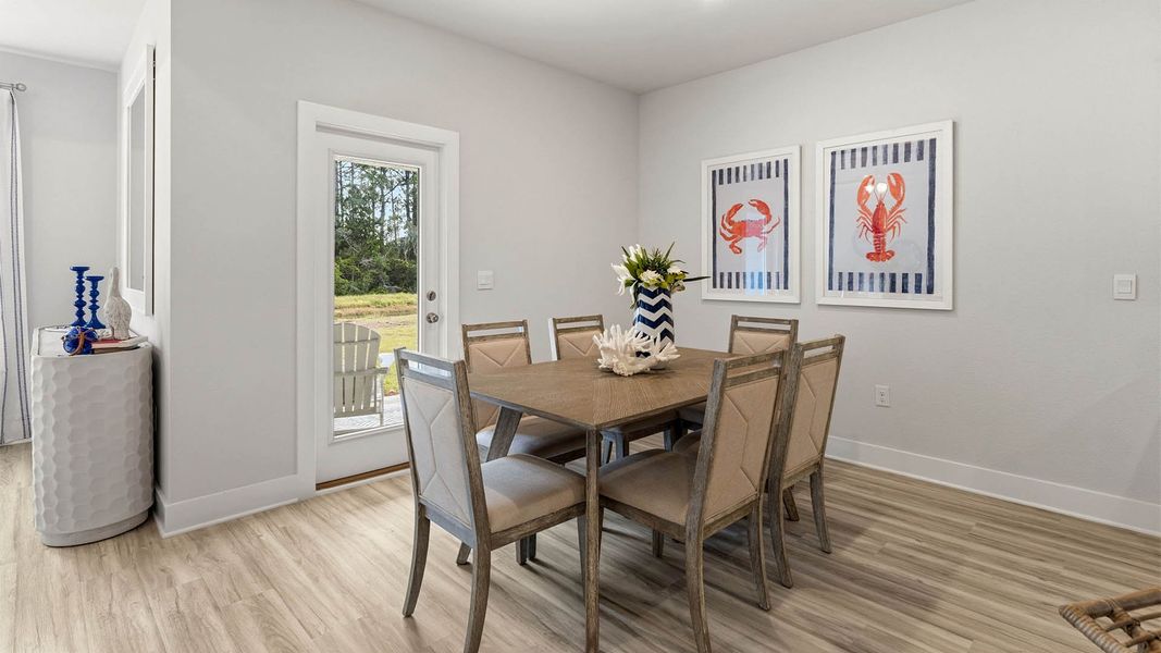 Furnished interior in a model home at Buffer Farms in Port Saint Joe (Image 9).