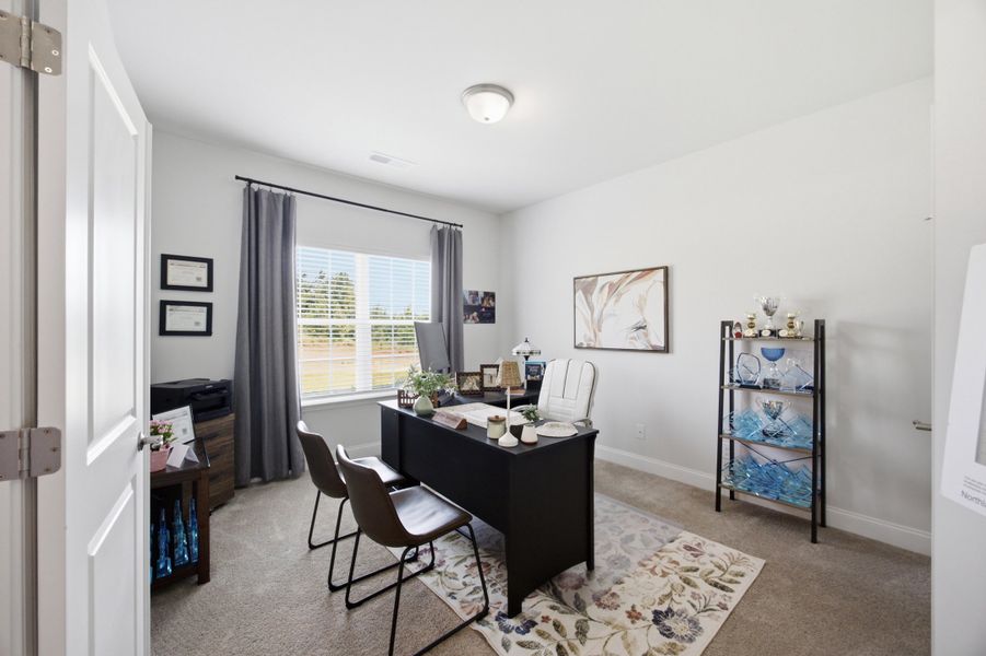 Furnished interior in a model home at Northlake in Statesville (Image 9).