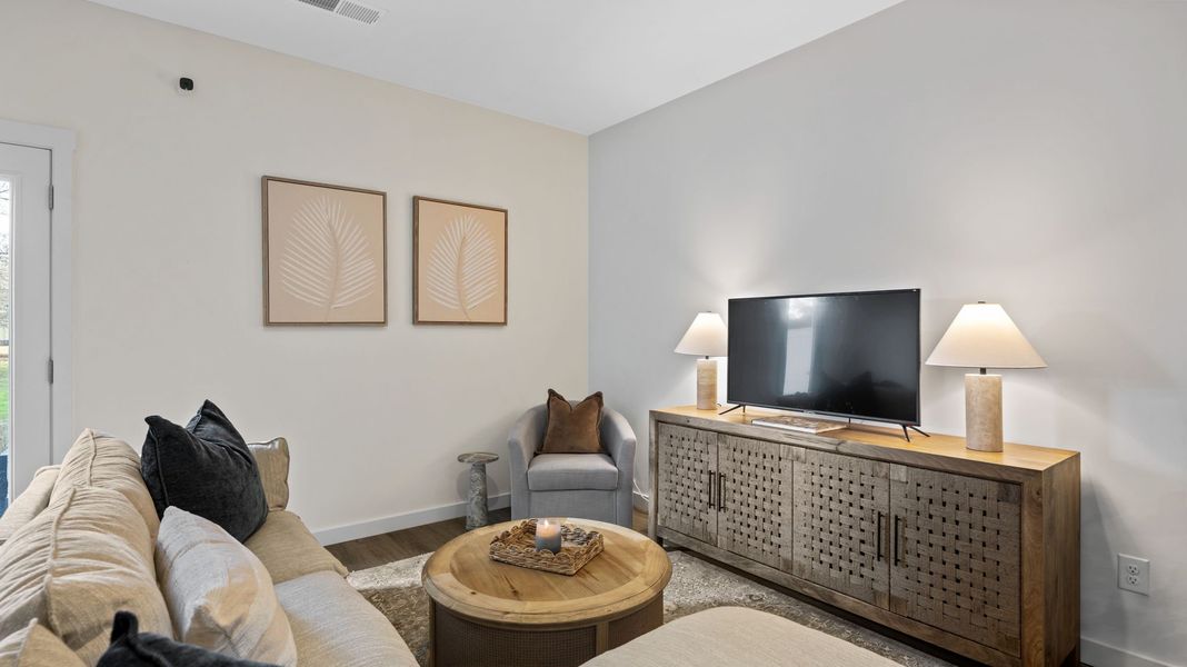 Furnished interior in a model home at Cambridge Cove in Chickamauga (Image 9).